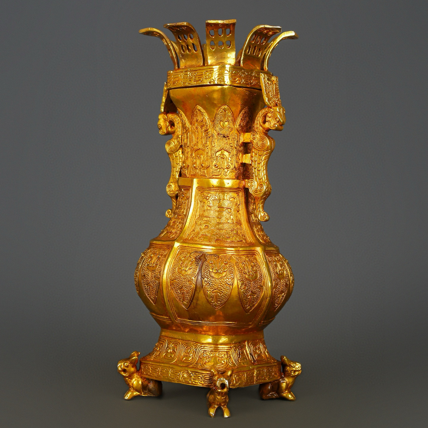 Han Dynasty gilt bronze and gold double dragon bottle
