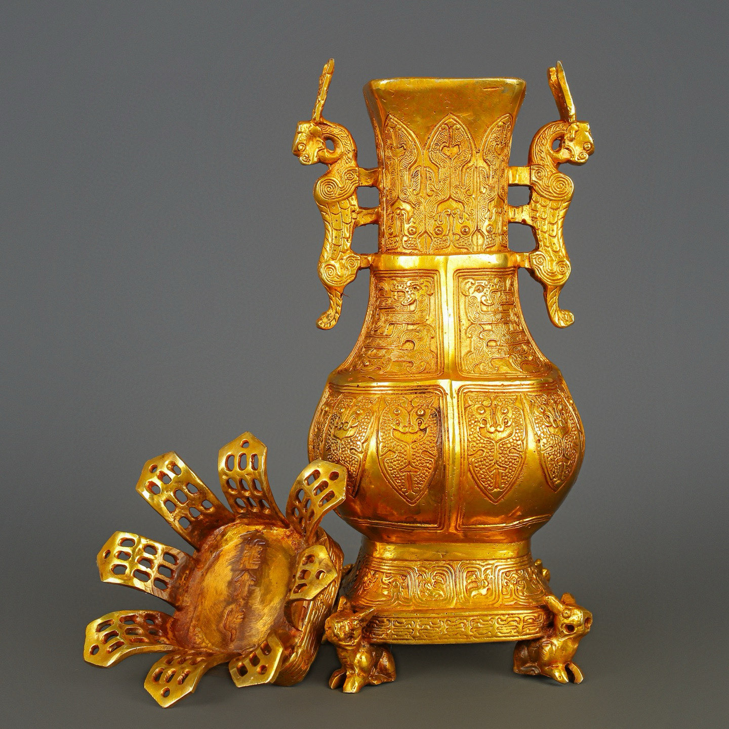 Han Dynasty gilt bronze and gold double dragon bottle