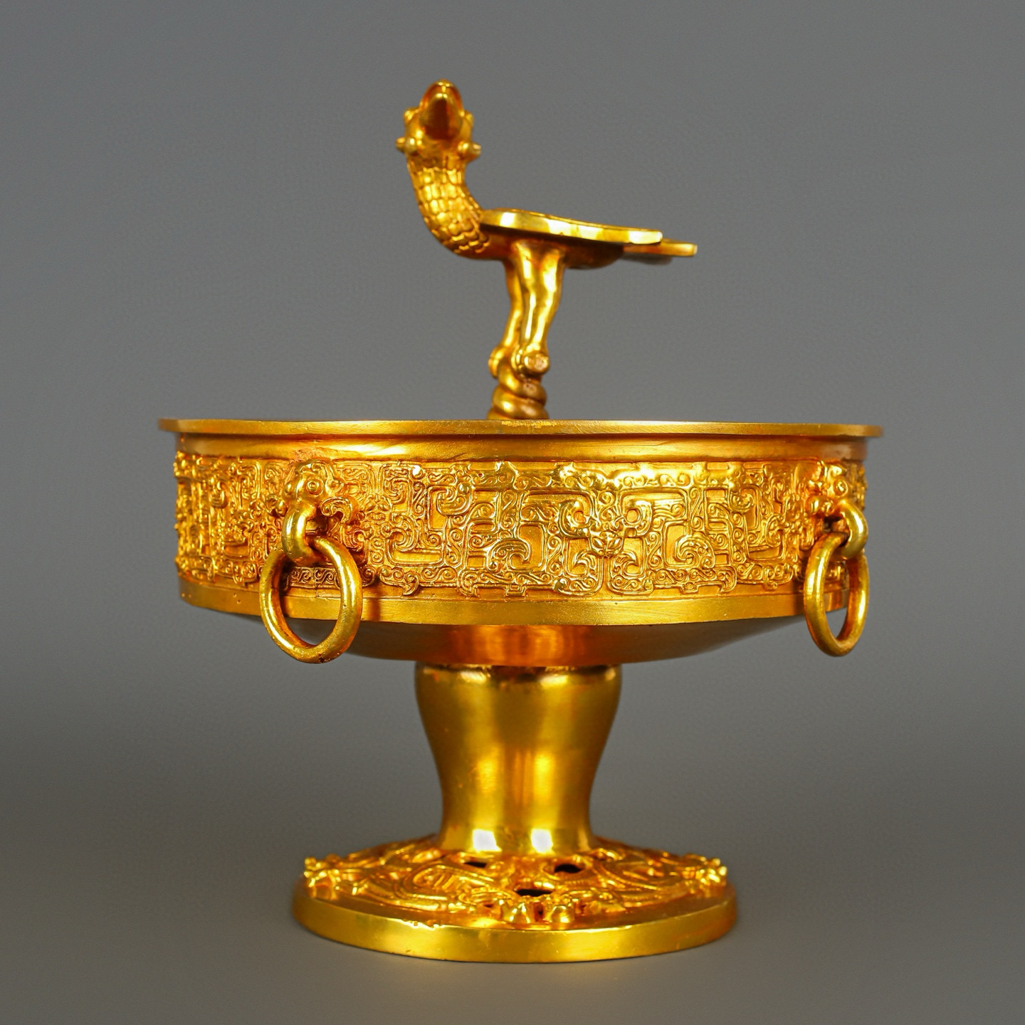 Han Dynasty gilt bronze and gold standing bird plate