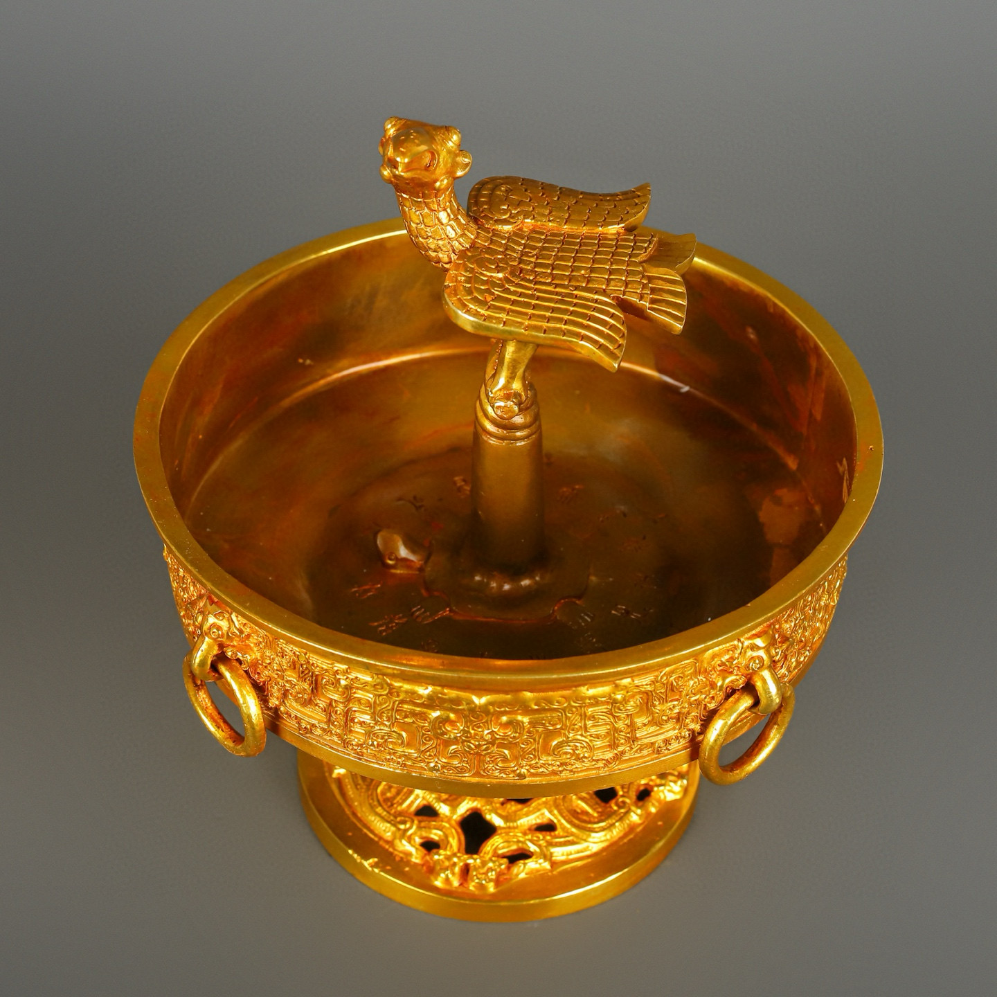 Han Dynasty gilt bronze and gold standing bird plate