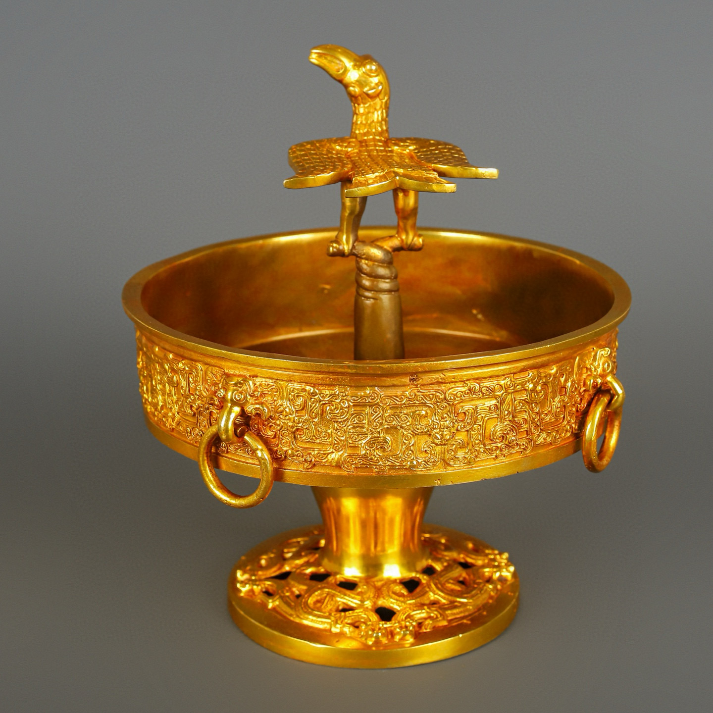 Han Dynasty gilt bronze and gold standing bird plate