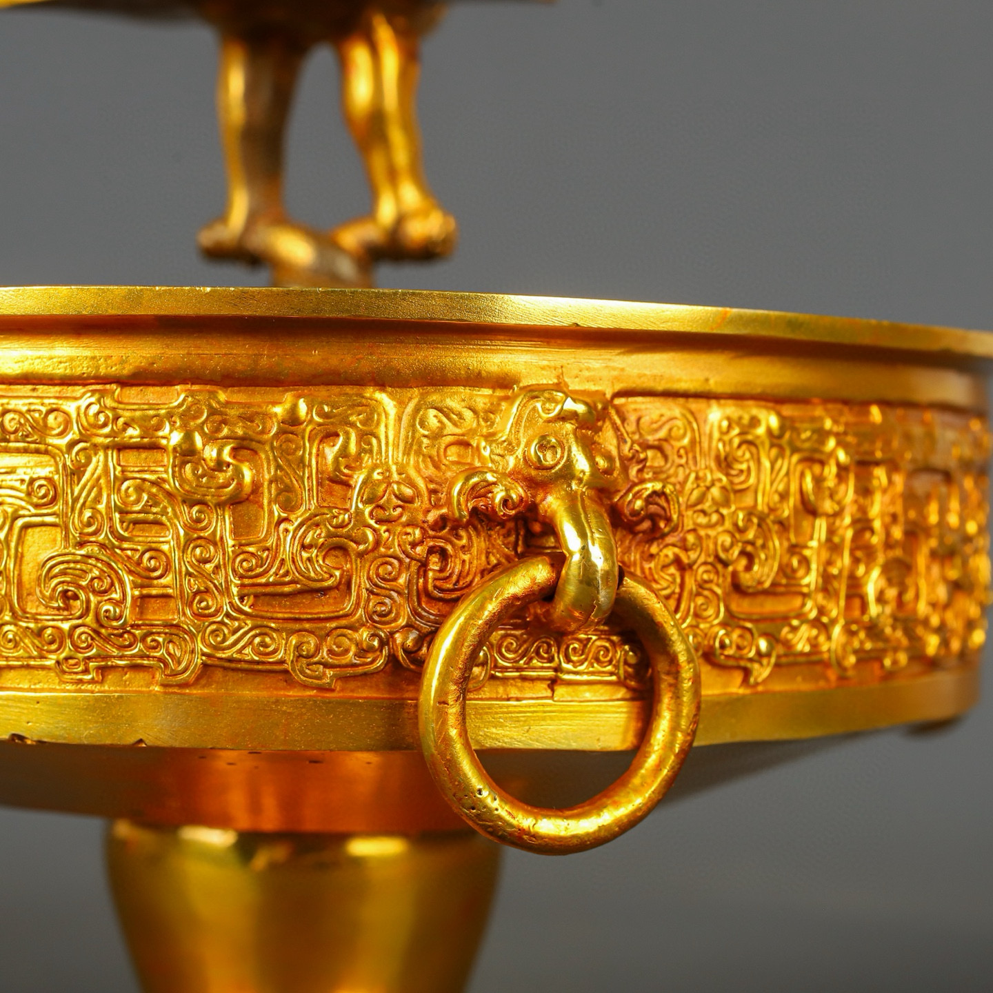 Han Dynasty gilt bronze and gold standing bird plate