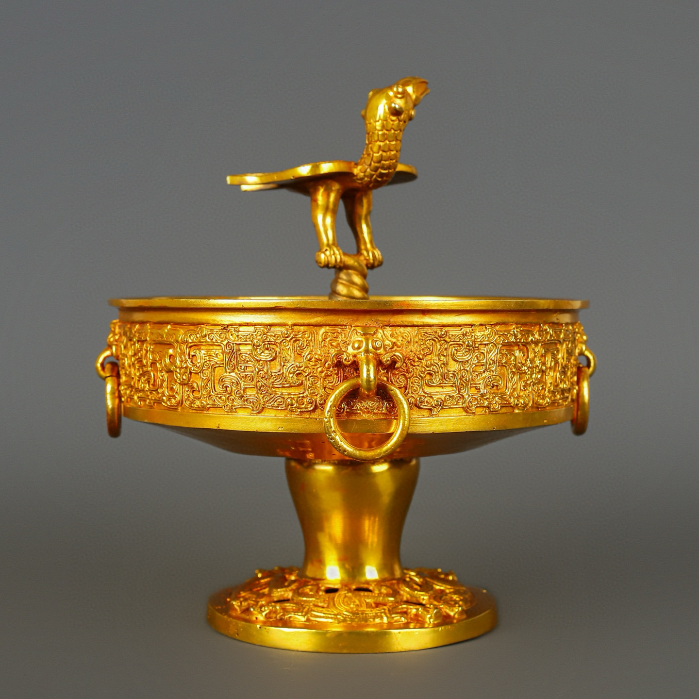 Han Dynasty gilt bronze and gold standing bird plate
