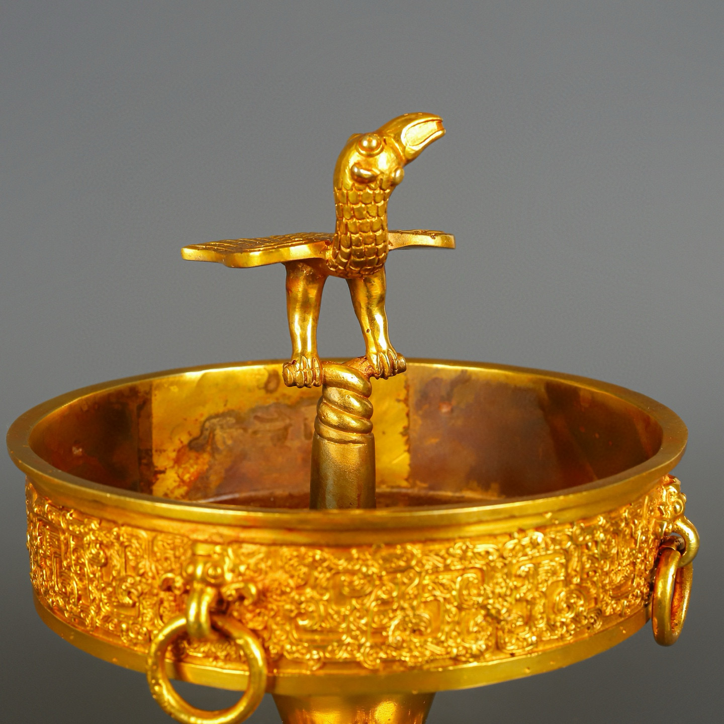 Han Dynasty gilt bronze and gold standing bird plate