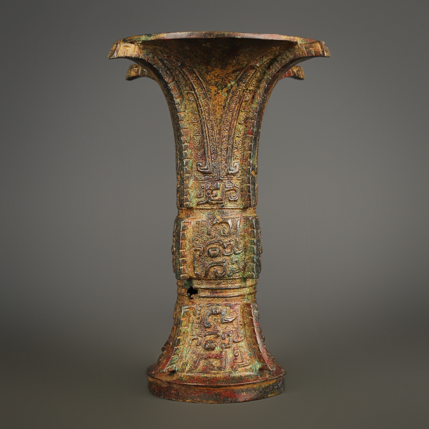 Zhou Dynasty Bronze Round Zun with Animal Mask Pattern