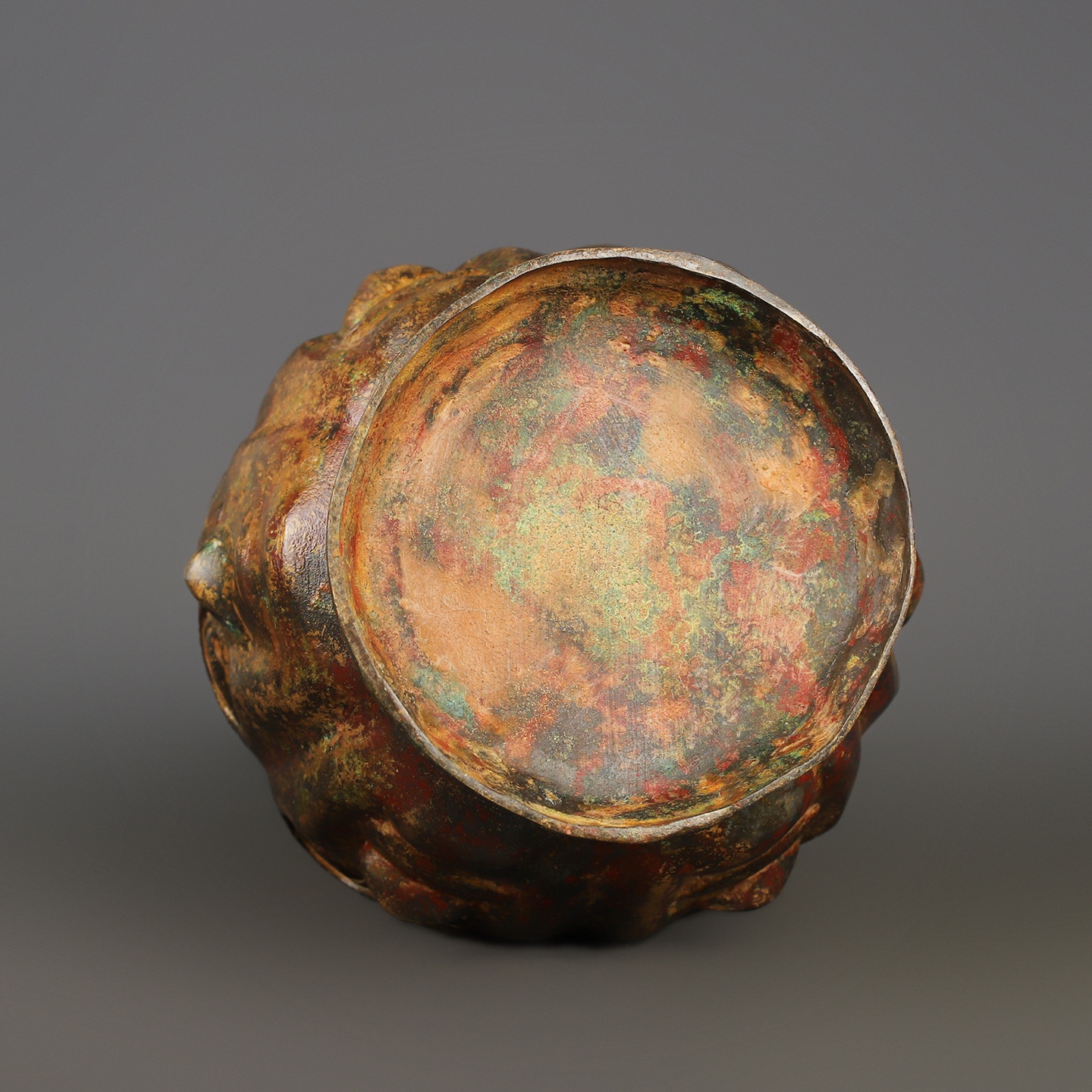 Zhou Dynasty Bronze Human Face Vase