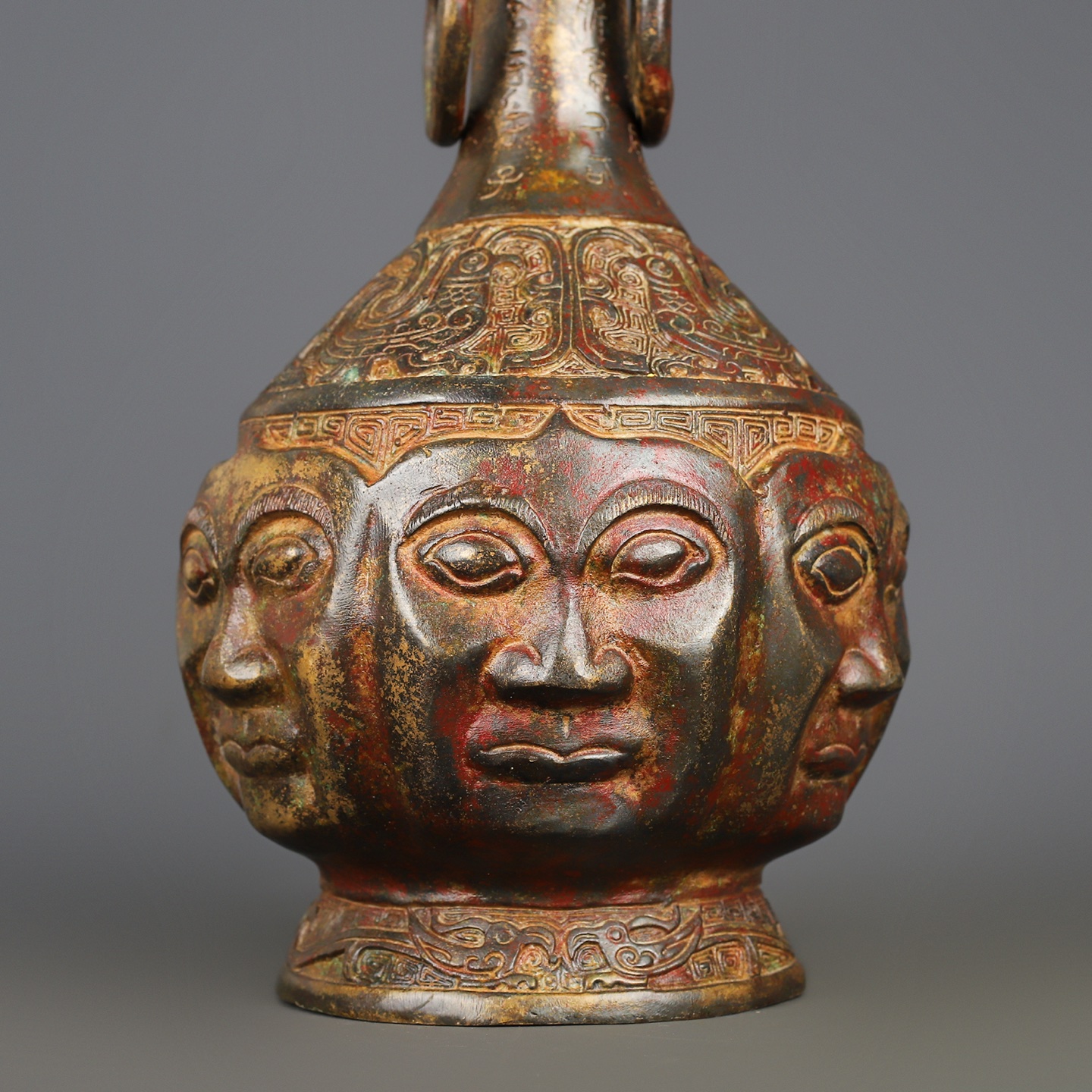 Zhou Dynasty Bronze Human Face Vase