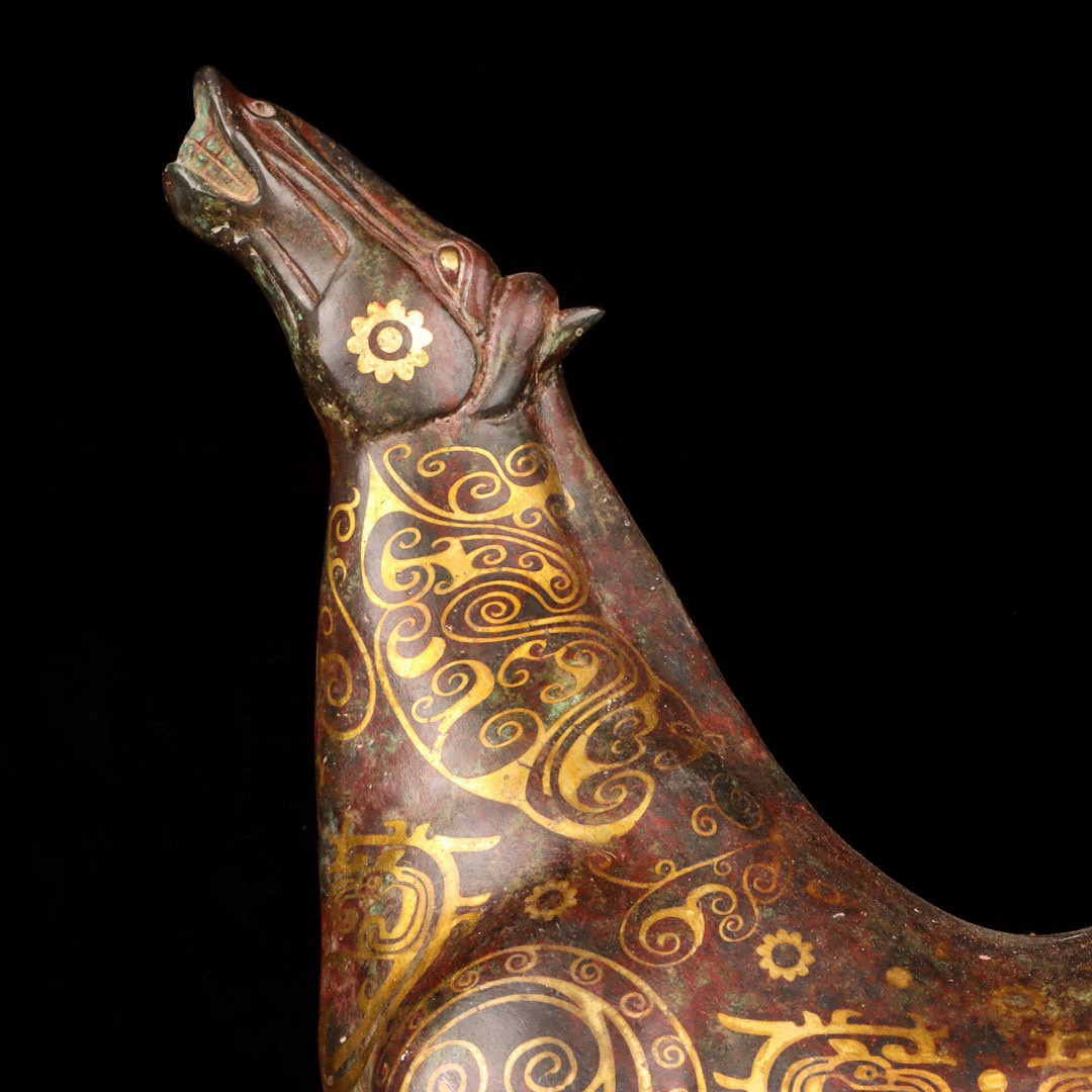 Han Dynasty Bronze and Gold Howling Pegasus