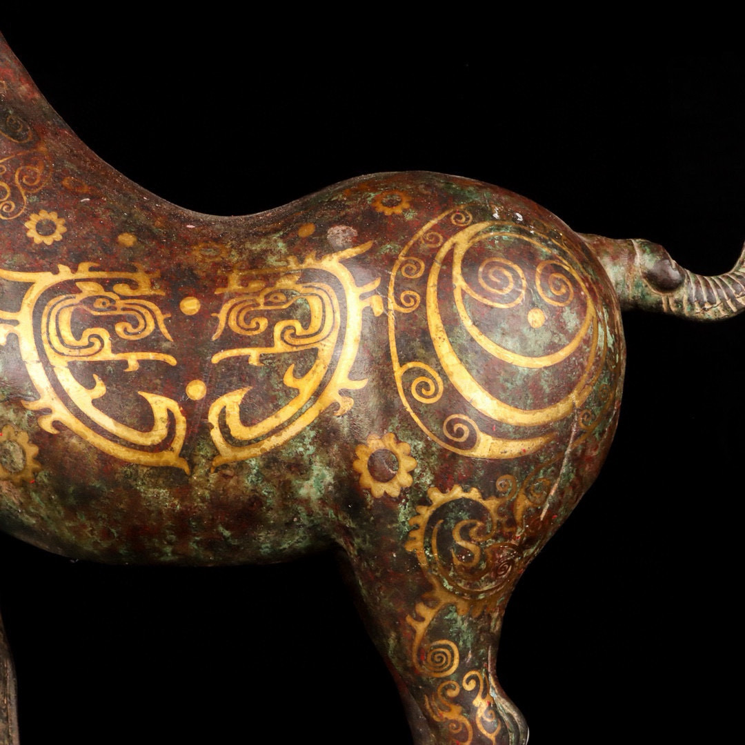 Han Dynasty Bronze and Gold Howling Pegasus