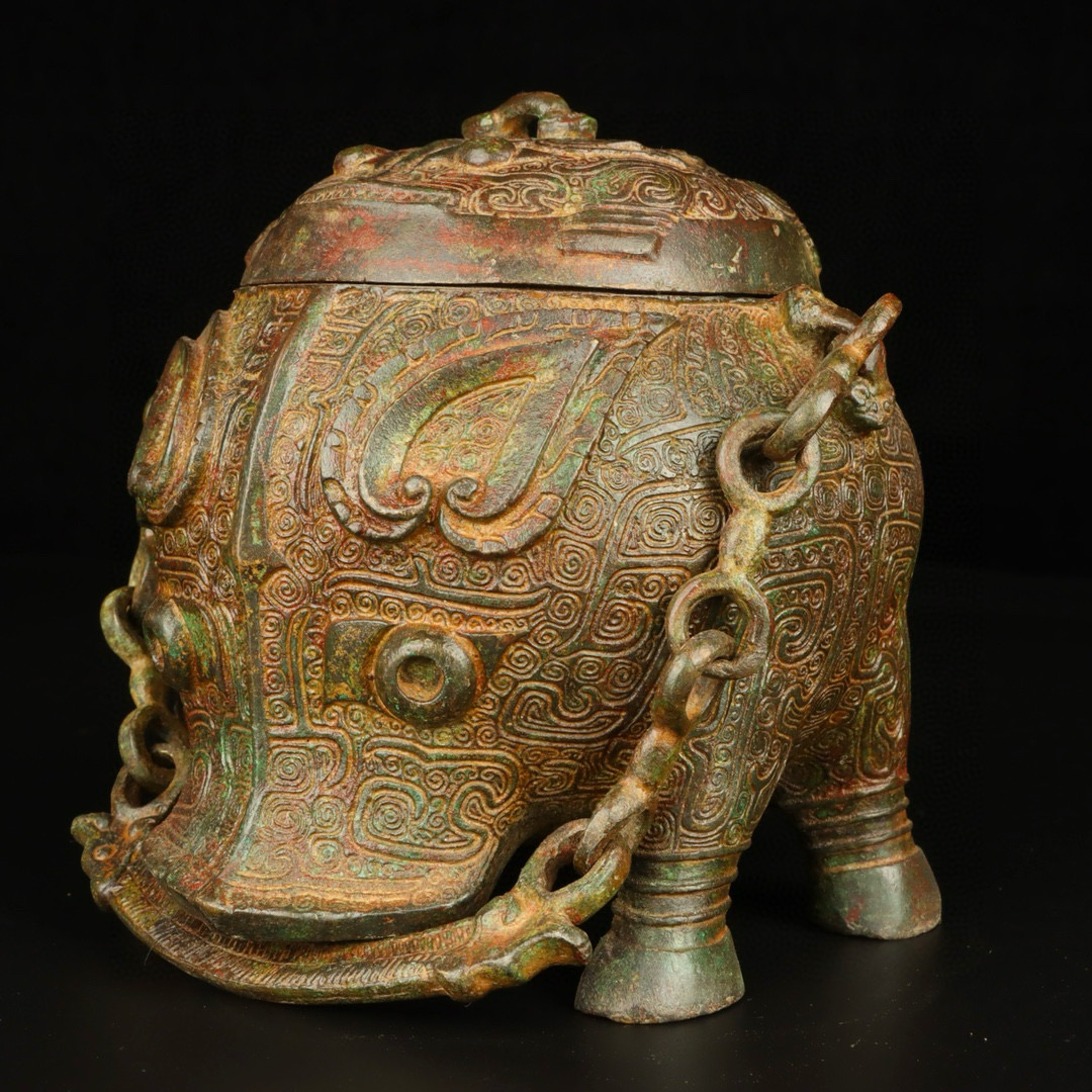 Zhou Dynasty Bronze double sided animal pattern handle