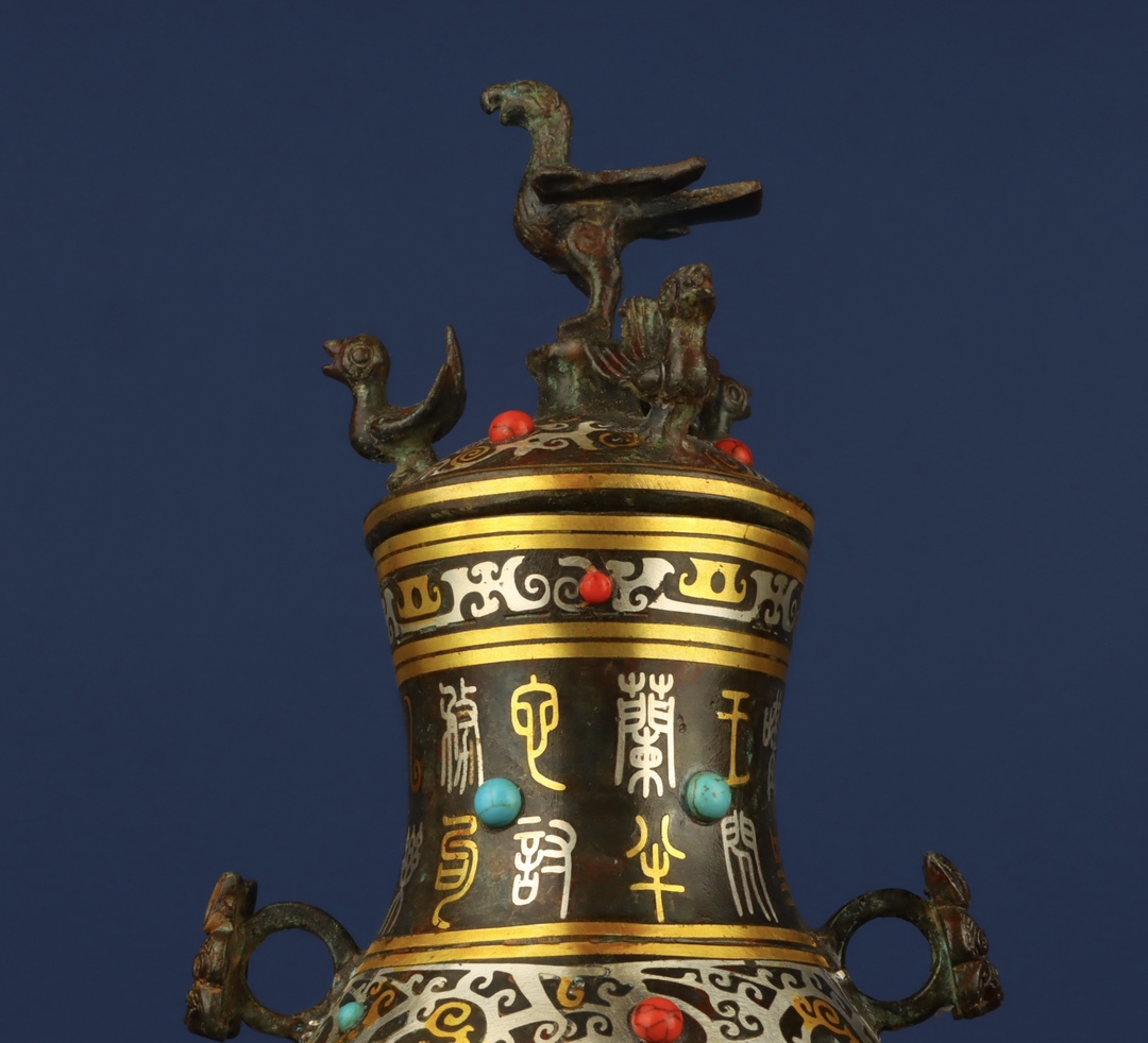 Han Dynasty Bronze gold and silver inlaid multi jewel standing bird vase