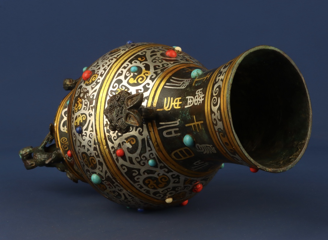 Han Dynasty Bronze gold and silver inlaid multi jewel standing bird vase