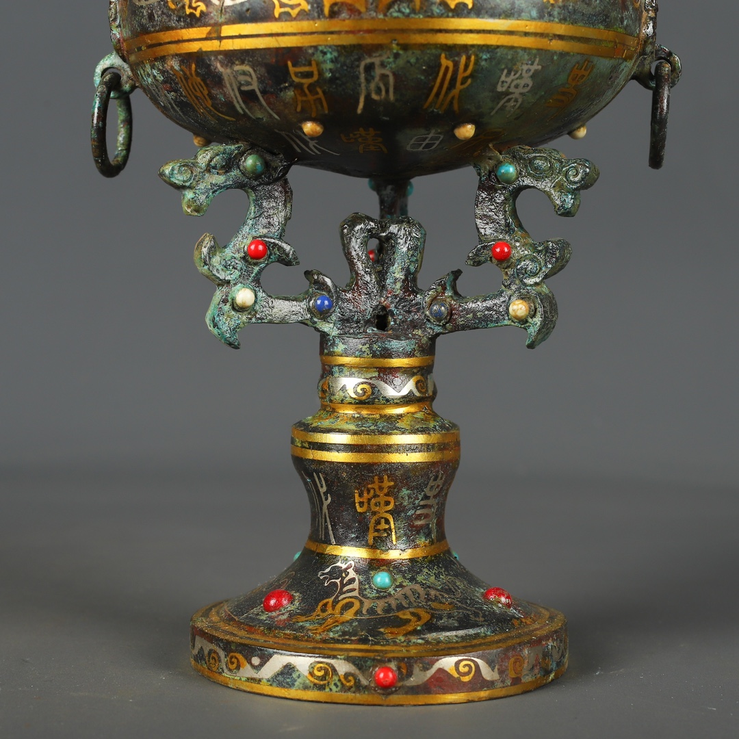 Han Dynasty Bronze and gold inlaid standing bird bean