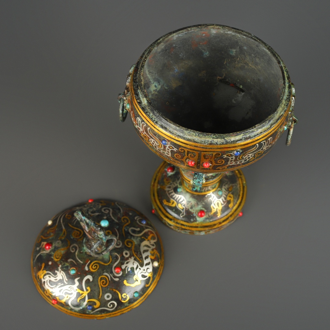Han Dynasty Bronze and gold inlaid standing bird bean