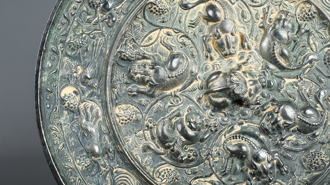 Tang Dynasty Bronze Grape Mirror with Auspicious Beasts