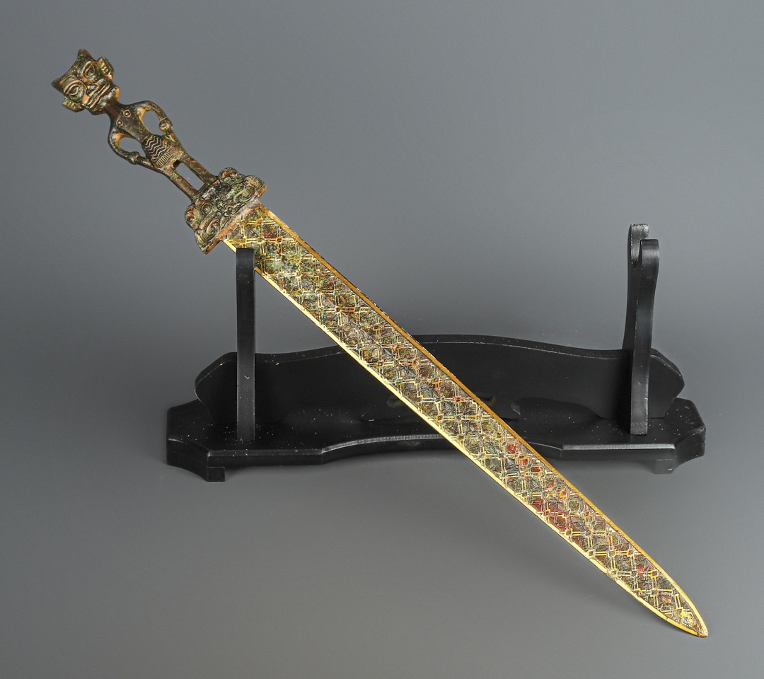 Han Dynasty Bronze three star stacked sword with gold inscriptions