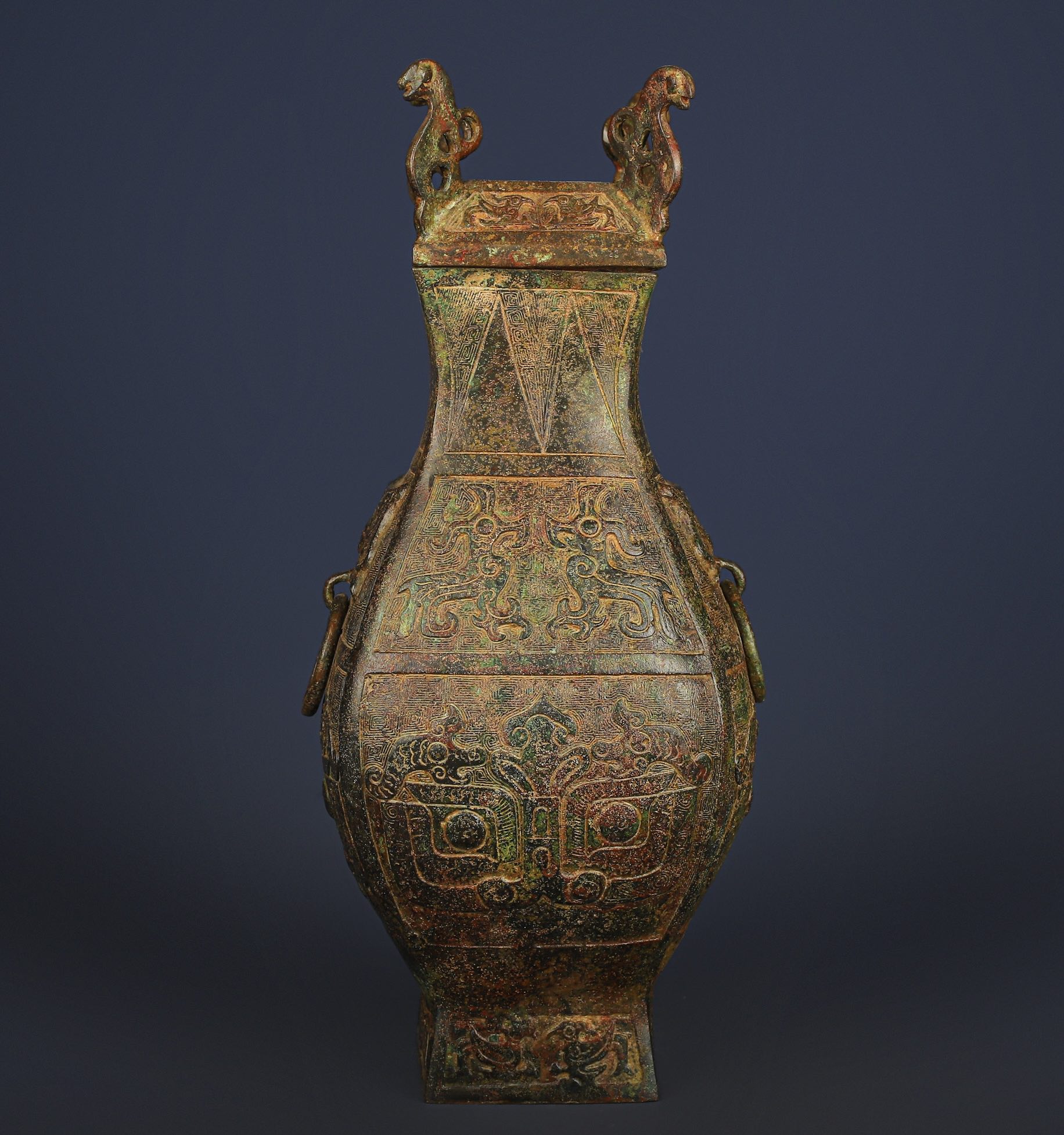 Han Dynasty Bronze square vase with dragon and phoenix patterns
