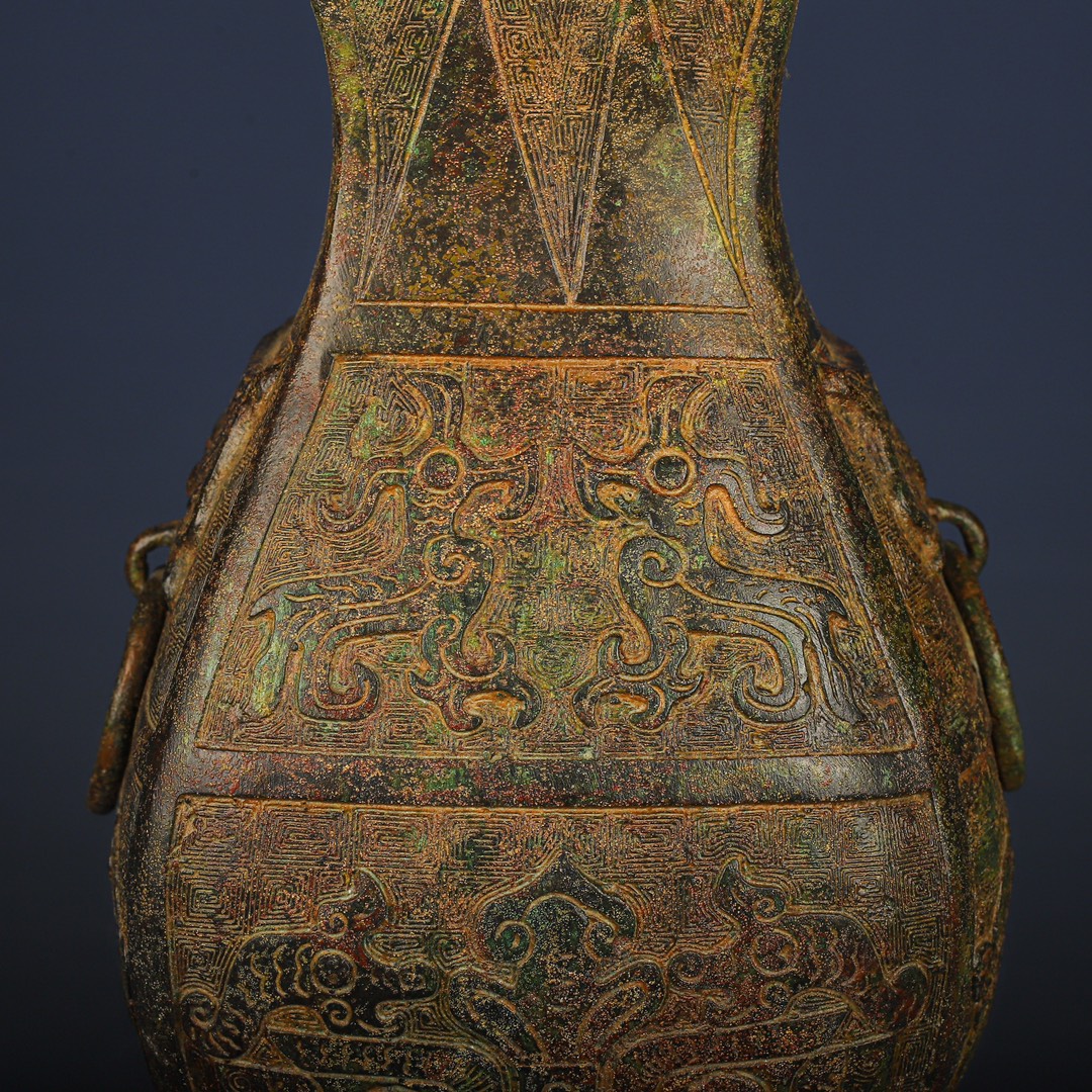 Han Dynasty Bronze square vase with dragon and phoenix patterns