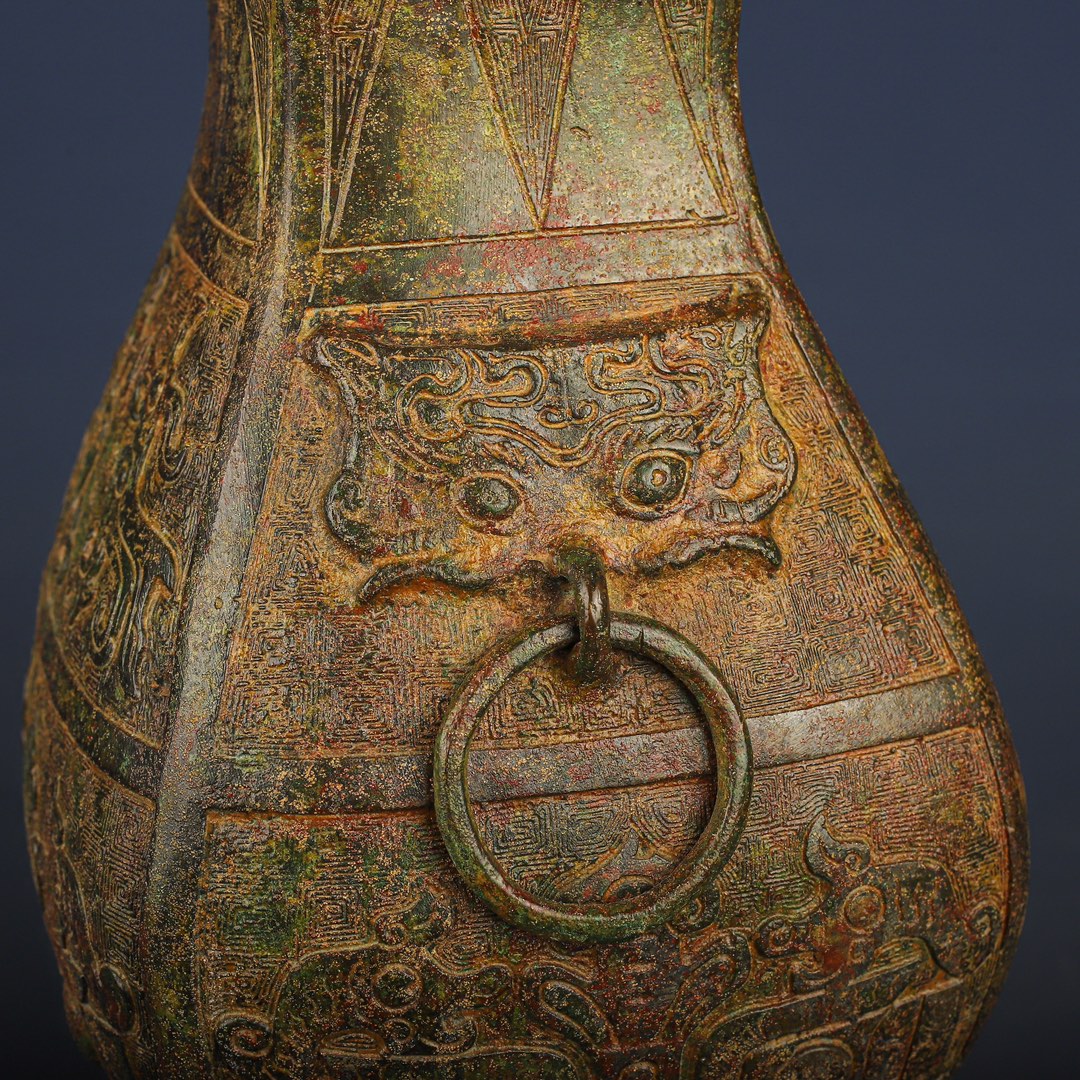 Han Dynasty Bronze square vase with dragon and phoenix patterns