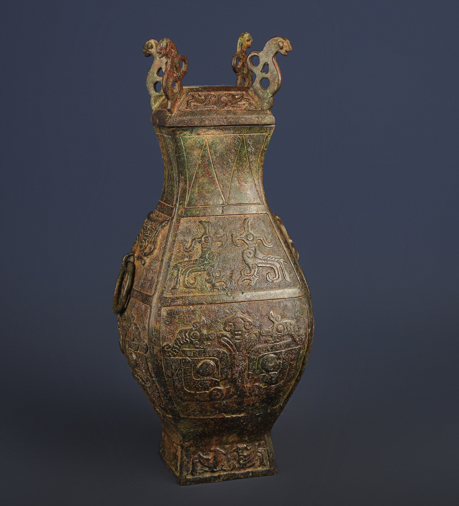 Han Dynasty Bronze square vase with dragon and phoenix patterns