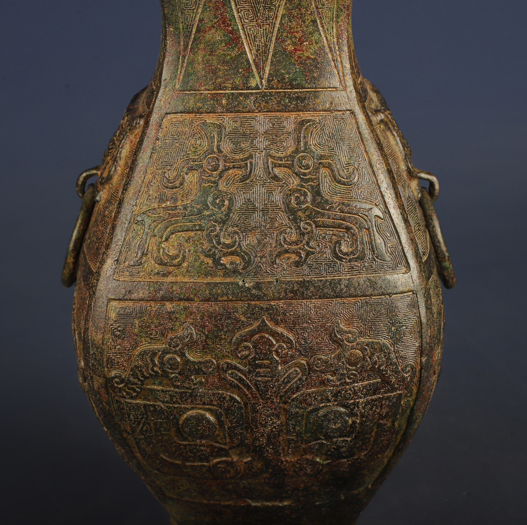 Han Dynasty Bronze square vase with dragon and phoenix patterns