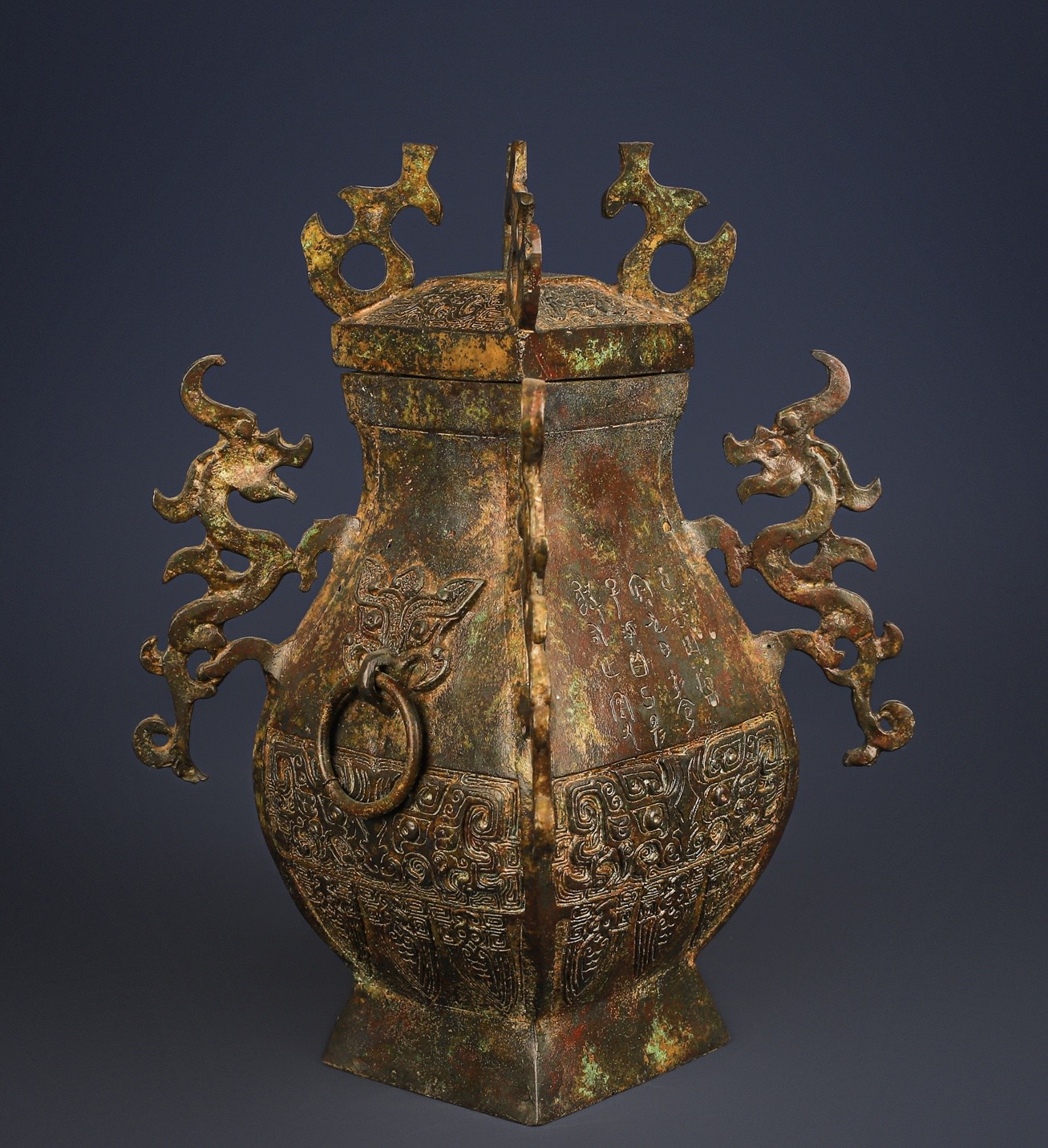 Han Dynasty Bronze square vase with four dragons inscription