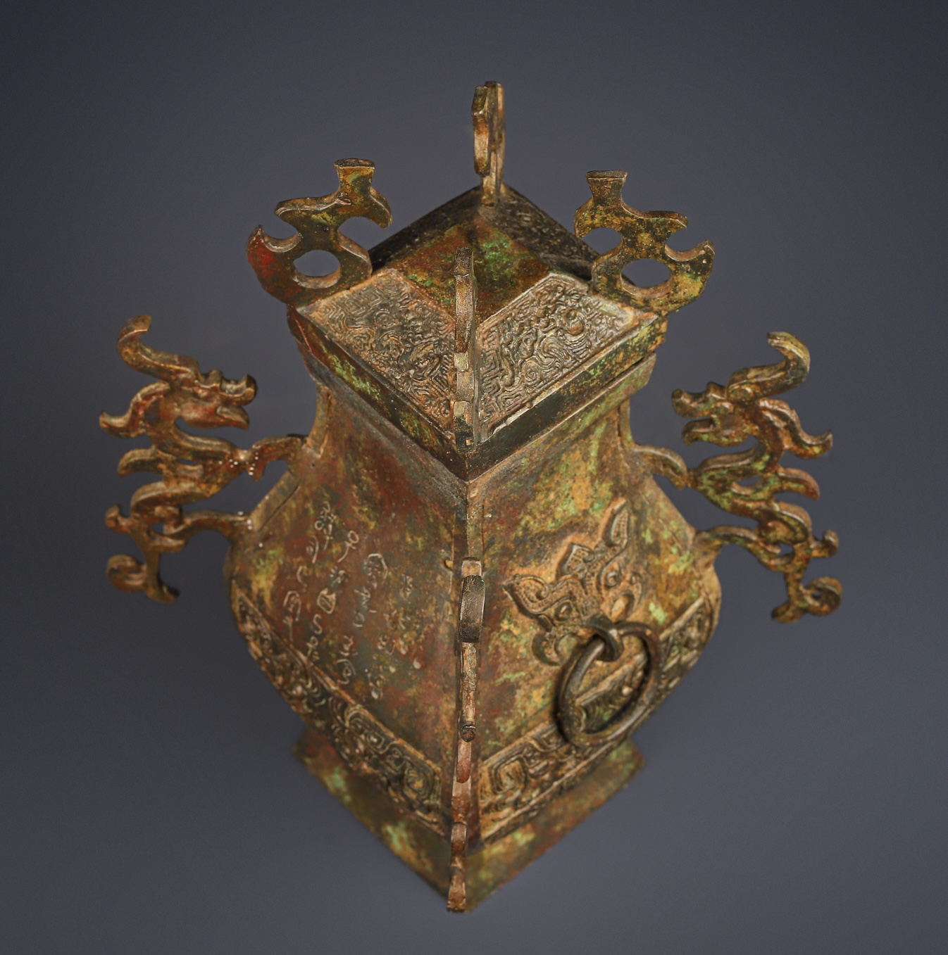Han Dynasty Bronze square vase with four dragons inscription
