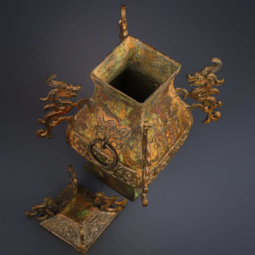 Han Dynasty Bronze square vase with four dragons inscription