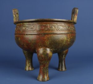 Zhou Dynasty Bronze one legged round tripod