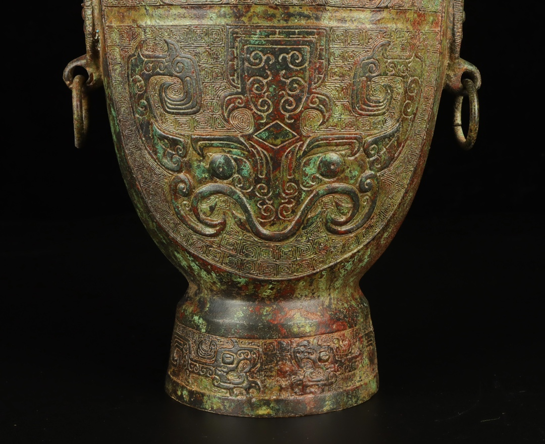 Zhou Dynasty Bronze animal mask bottle