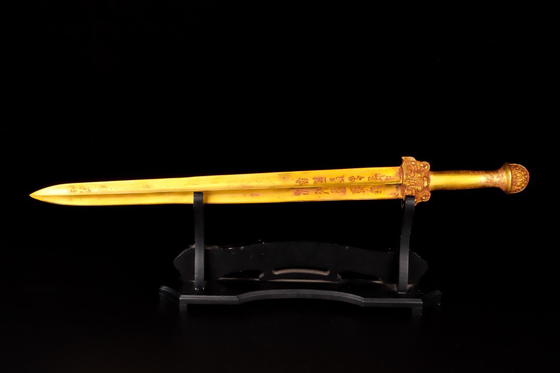 Han Dynasty gilt bronze sword with inscriptions