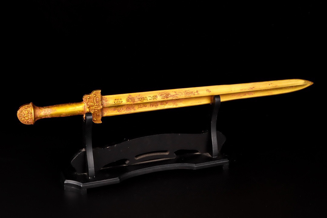Han Dynasty gilt bronze sword with inscriptions