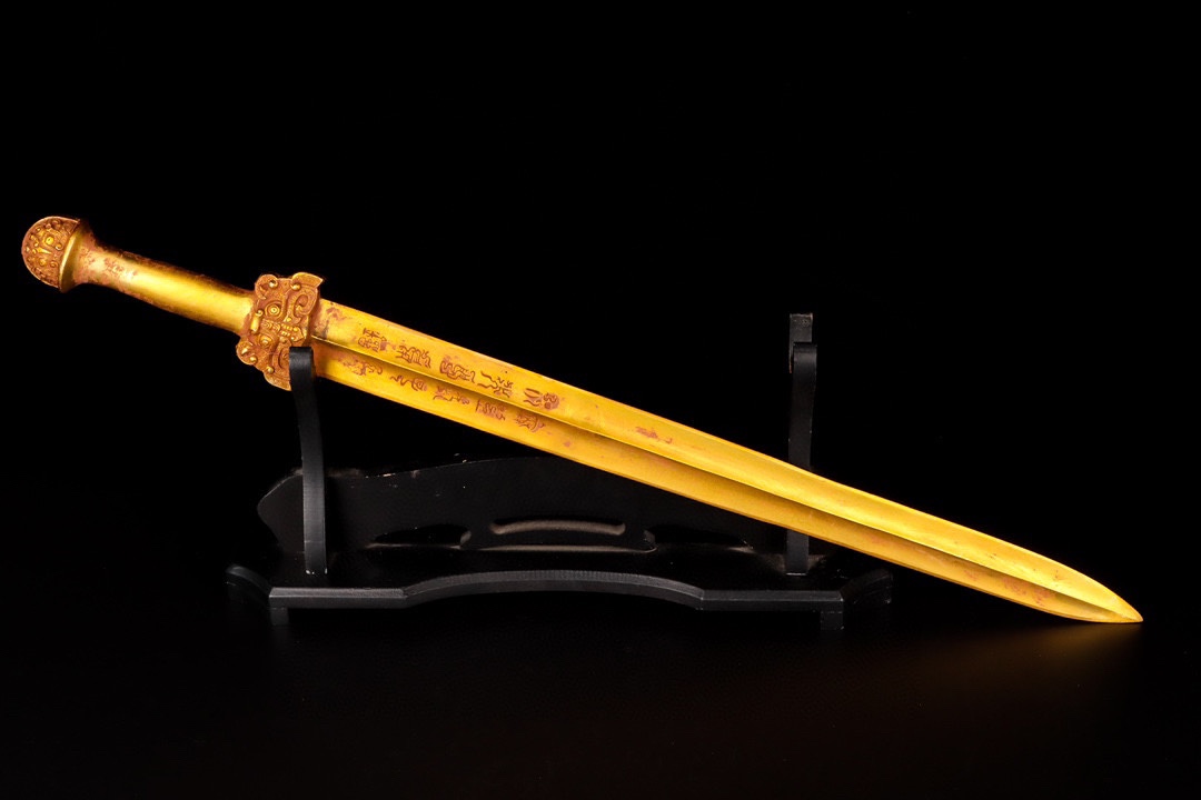 Han Dynasty gilt bronze sword with inscriptions