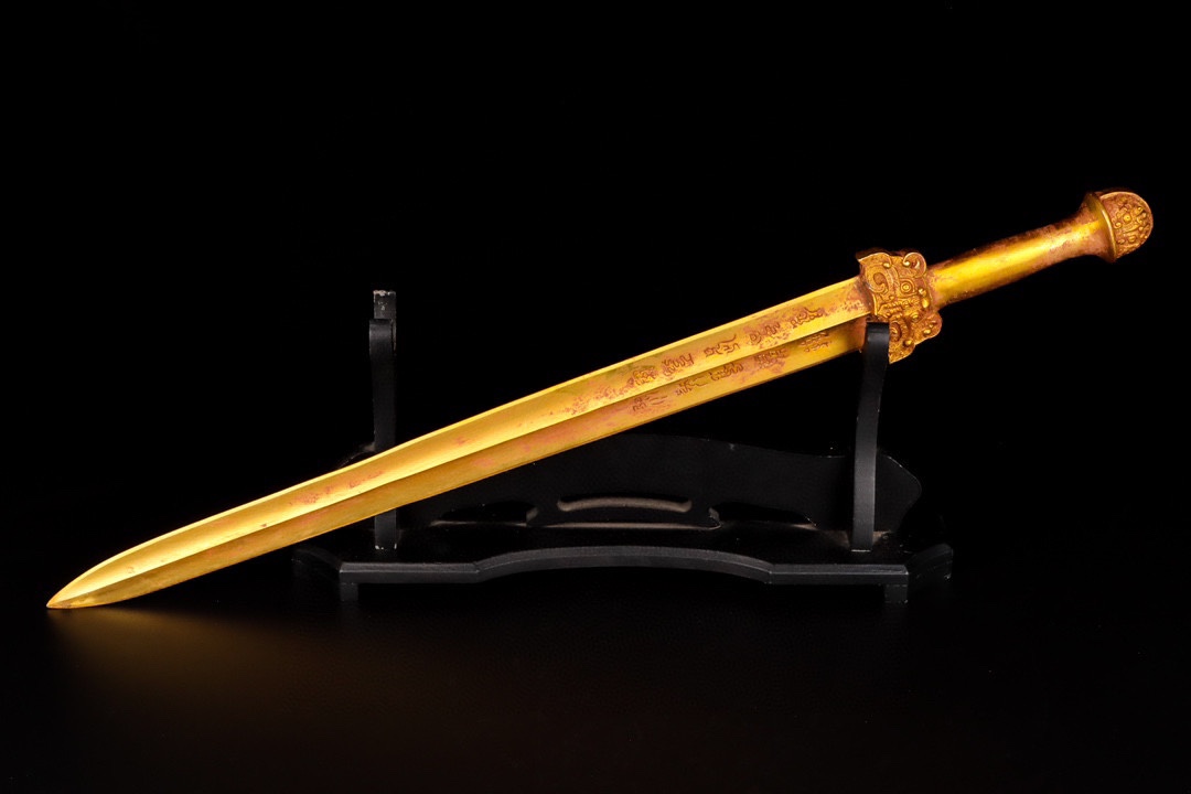 Han Dynasty gilt bronze sword with inscriptions