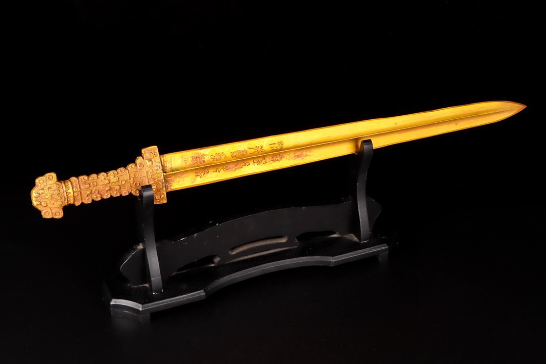 Han Dynasty gilt bronze sword with inscriptions