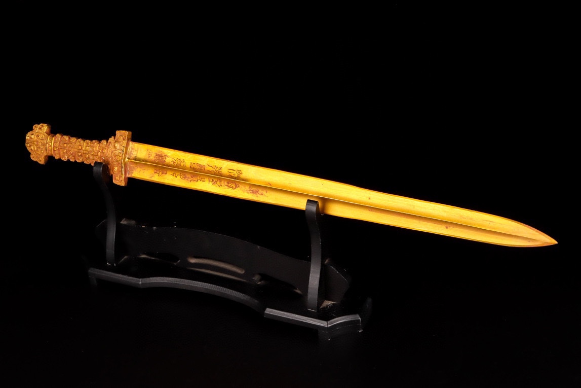 Han Dynasty gilt bronze sword with inscriptions