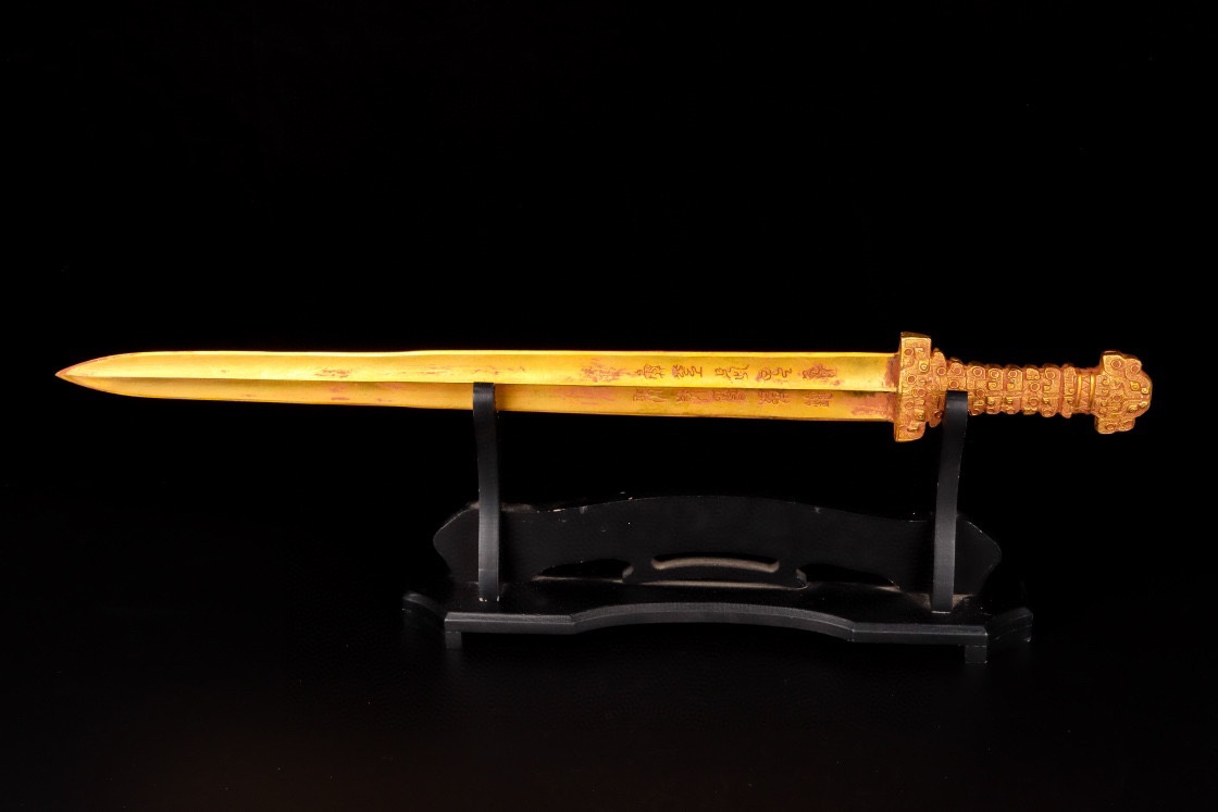 Han Dynasty gilt bronze sword with inscriptions