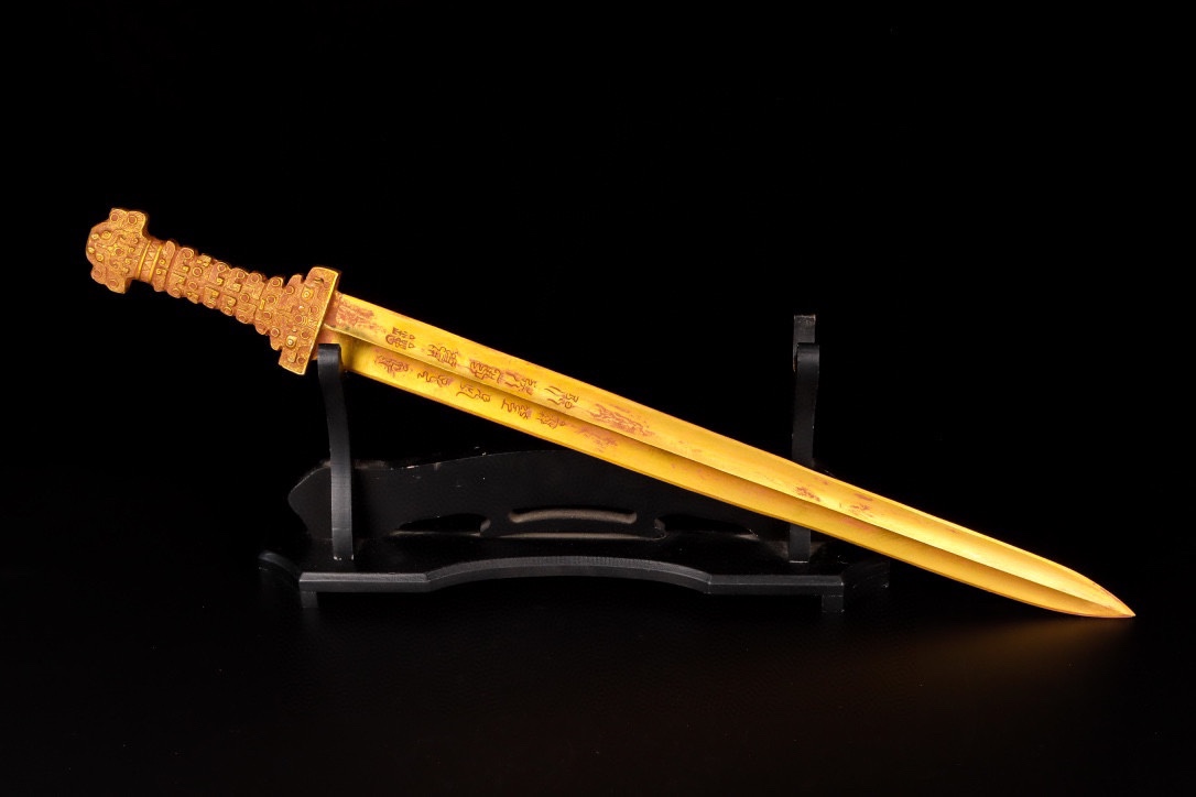 Han Dynasty gilt bronze sword with inscriptions