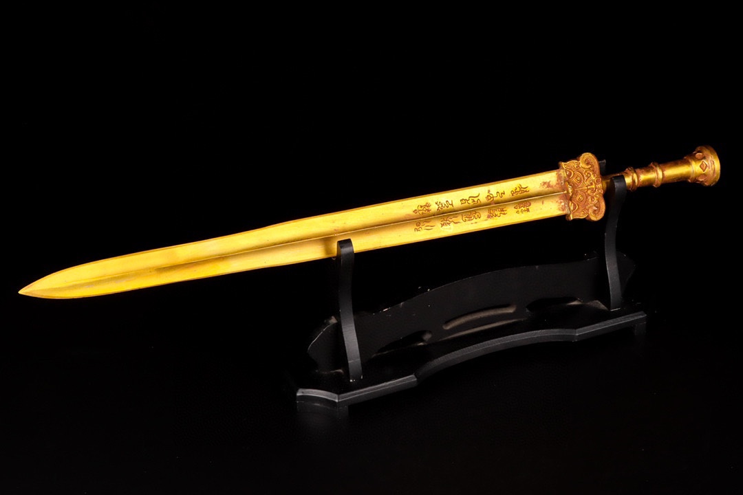Han Dynasty gilt bronze sword with inscriptions