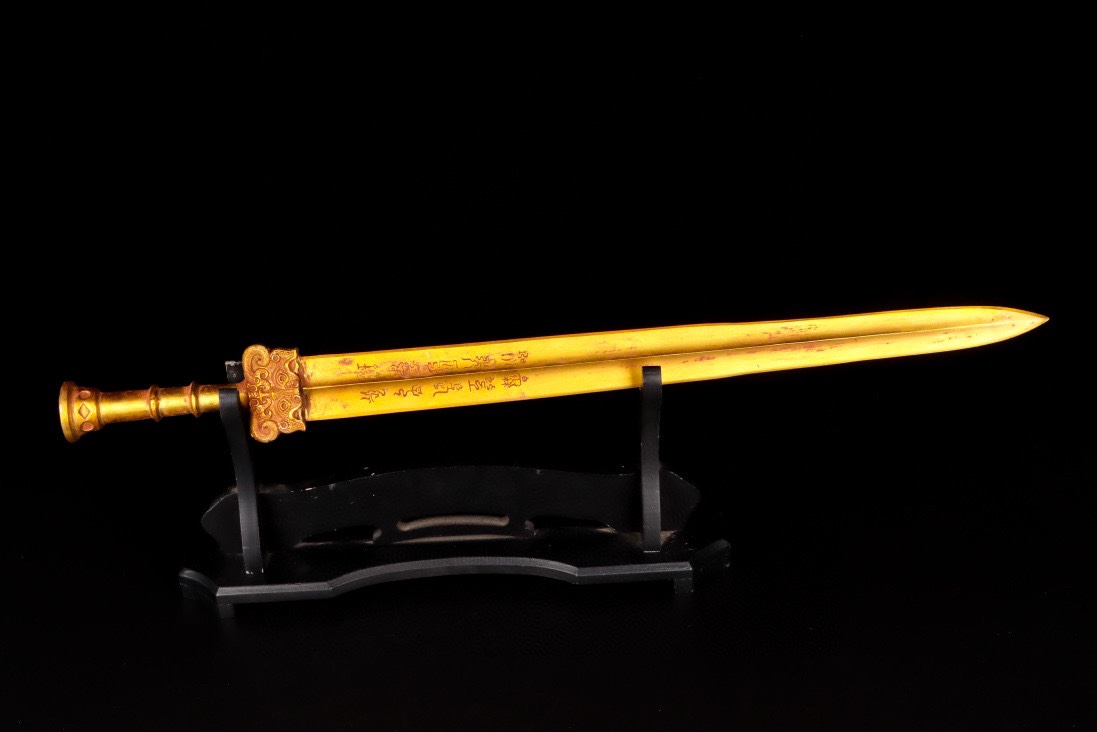 Han Dynasty gilt bronze sword with inscriptions