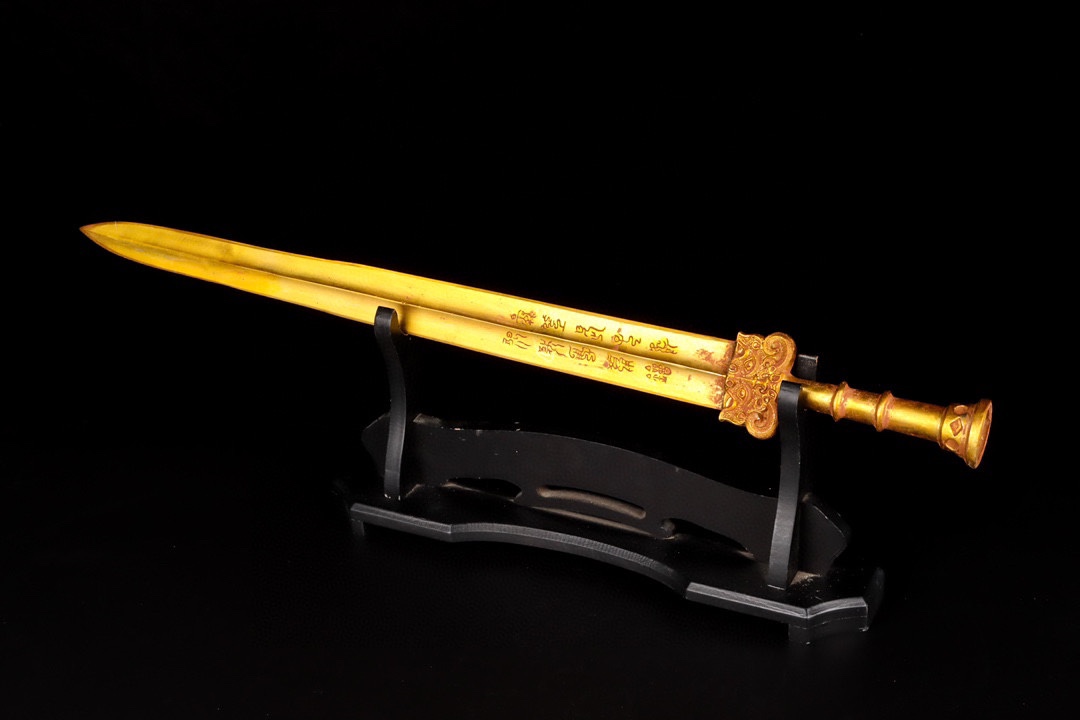 Han Dynasty gilt bronze sword with inscriptions