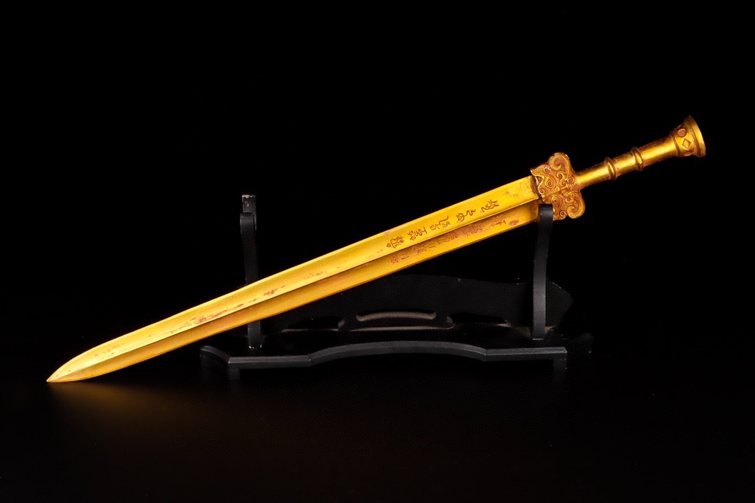 Han Dynasty gilt bronze sword with inscriptions