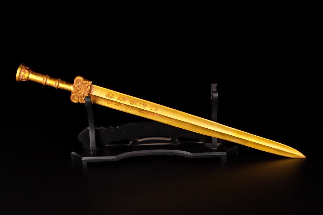 Han Dynasty gilt bronze sword with inscriptions