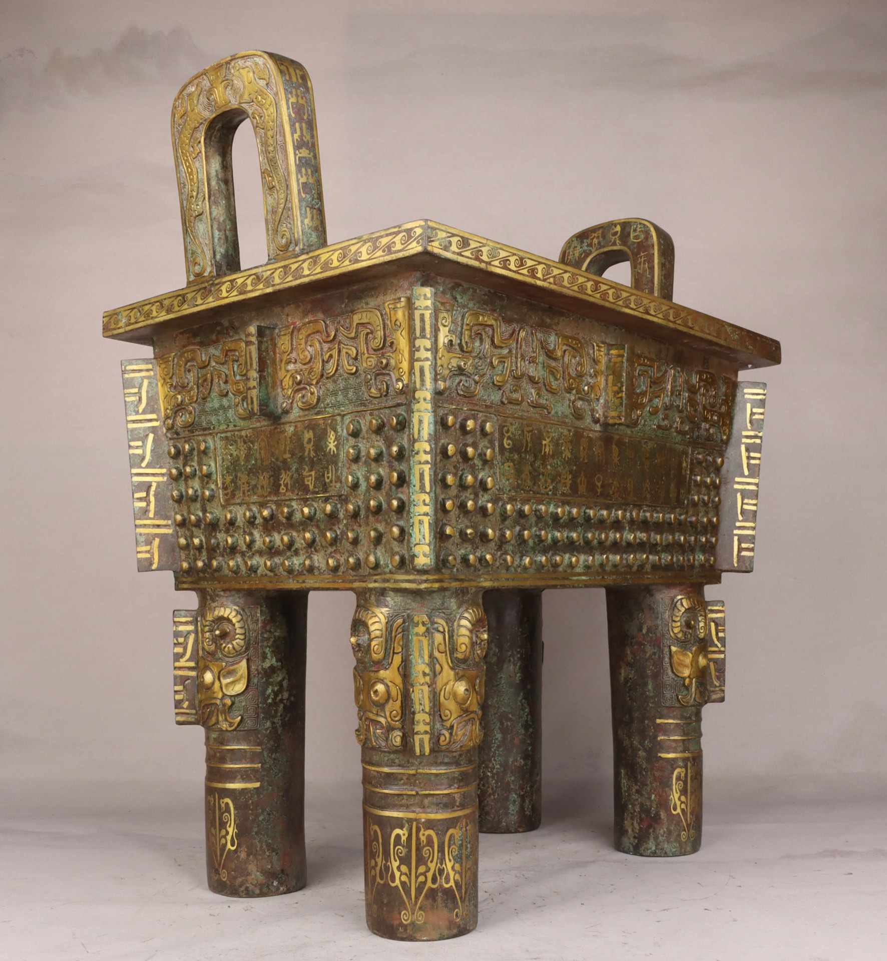 Zhou Dynasty Bronze and gold studded square tripod