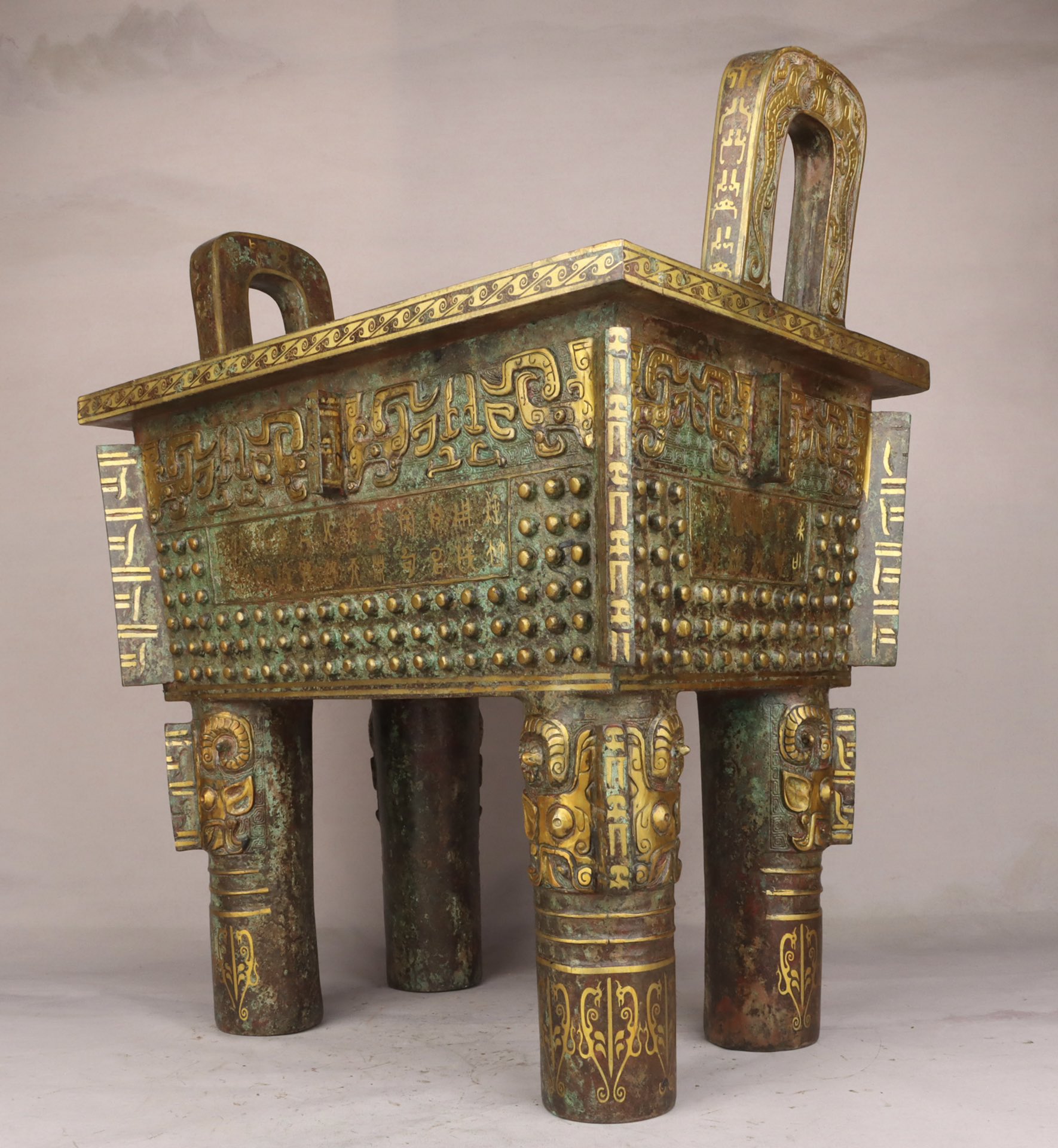 Zhou Dynasty Bronze and gold studded square tripod
