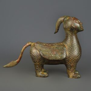 Zhou Dynasty Bronze human faced long tailed beast