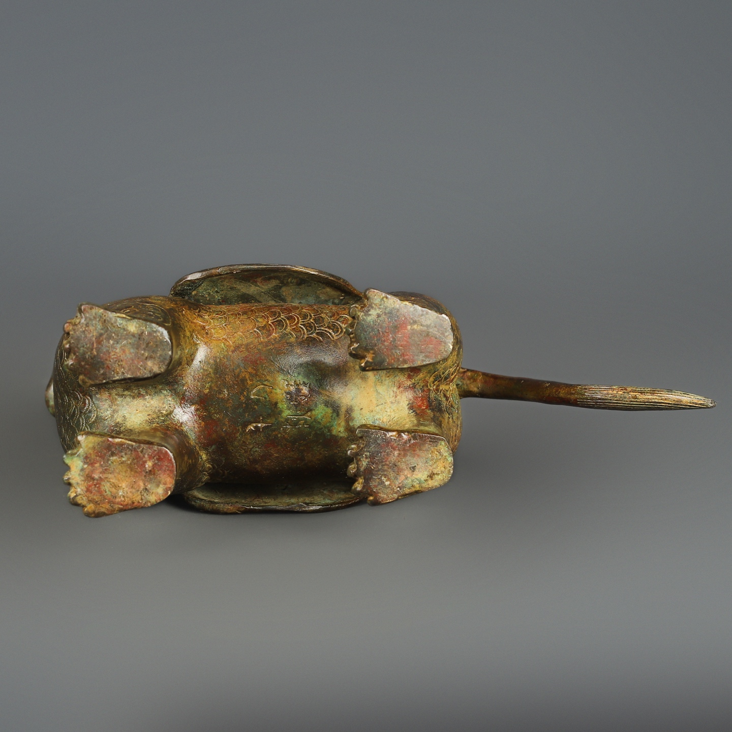 Zhou Dynasty Bronze human faced long tailed beast