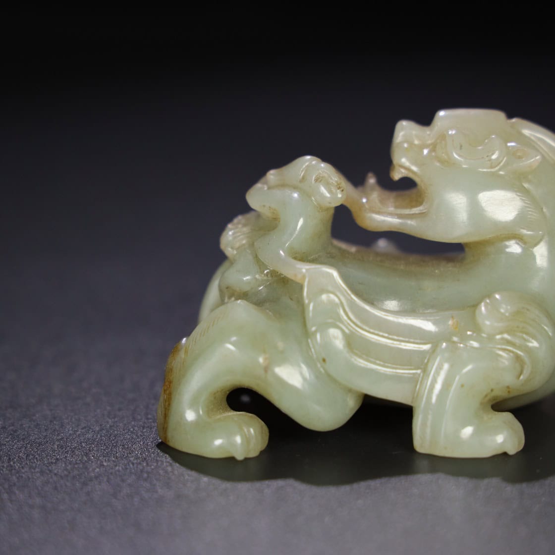 Chinese Natural Jade Carved Feathered Man and Beast