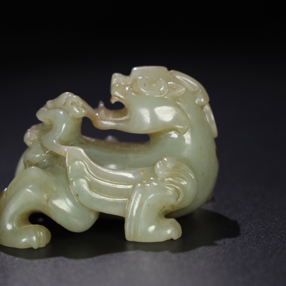 Chinese Natural Jade Carved Feathered Man and Beast