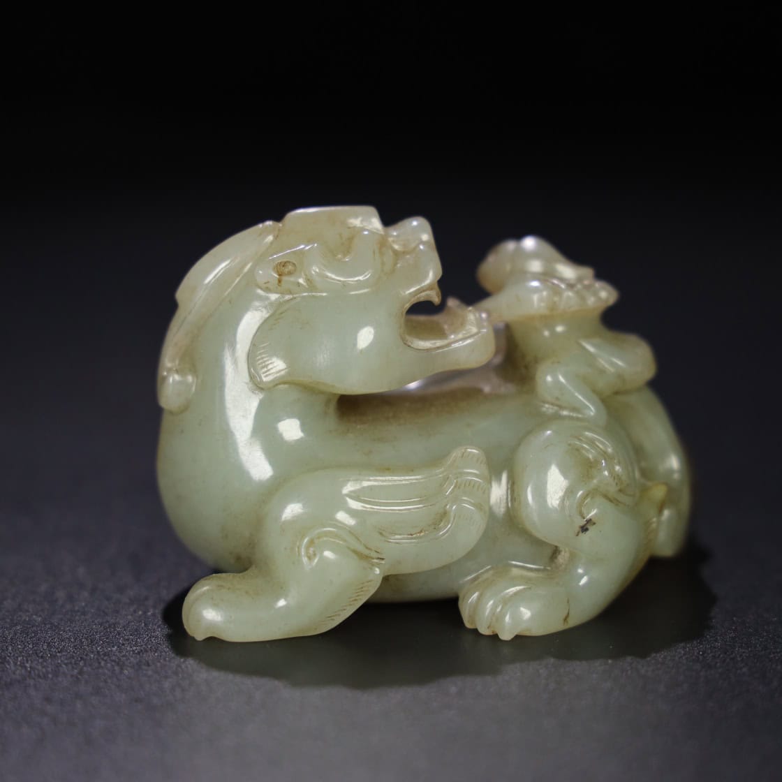 Chinese Natural Jade Carved Feathered Man and Beast